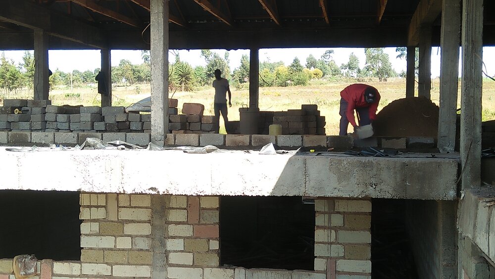 Positioning cut stones for walls