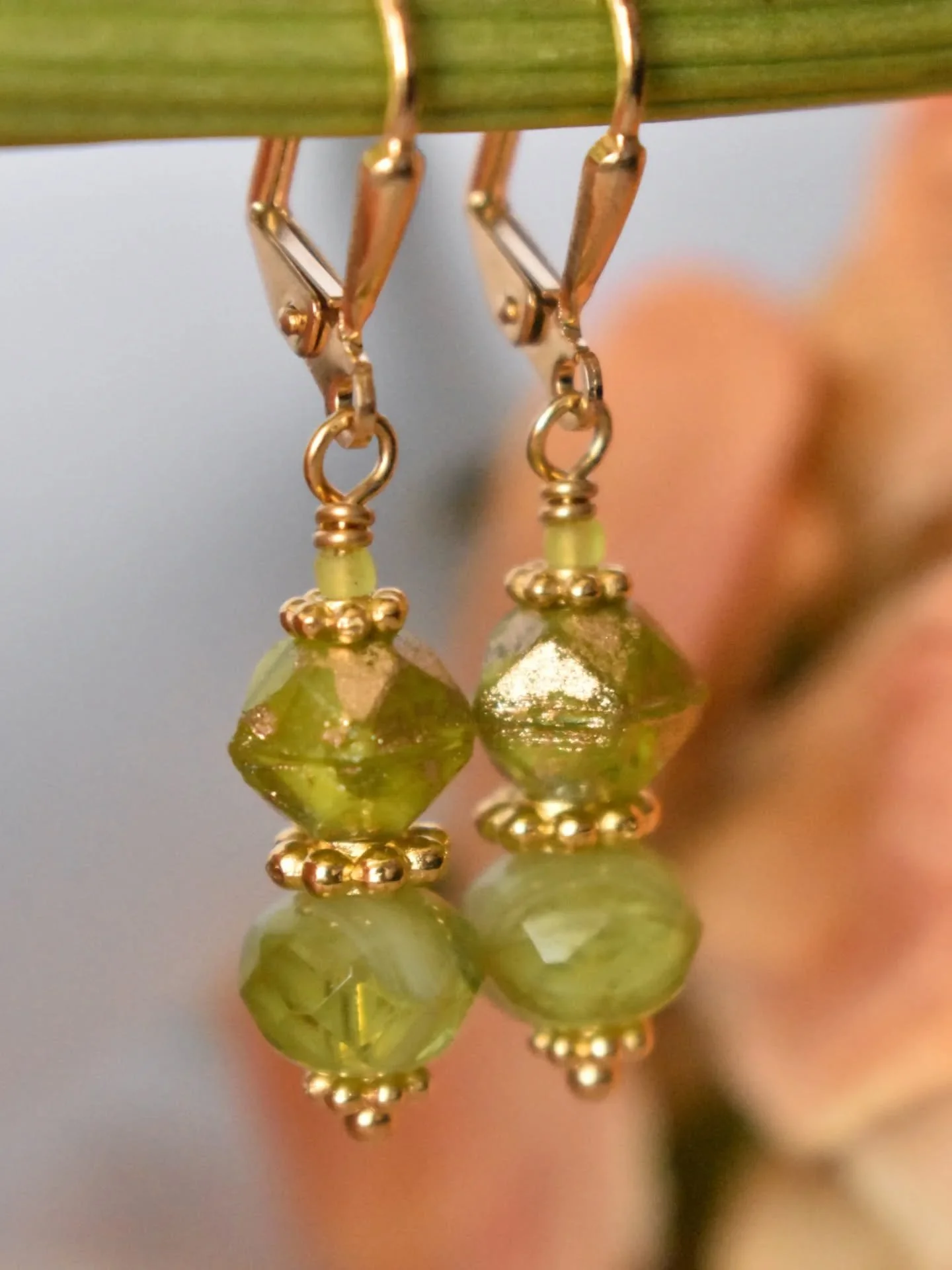 Your Radiance earrings, just the sweetest, little, chartreuse and gold pair. That new leaf color is everything.