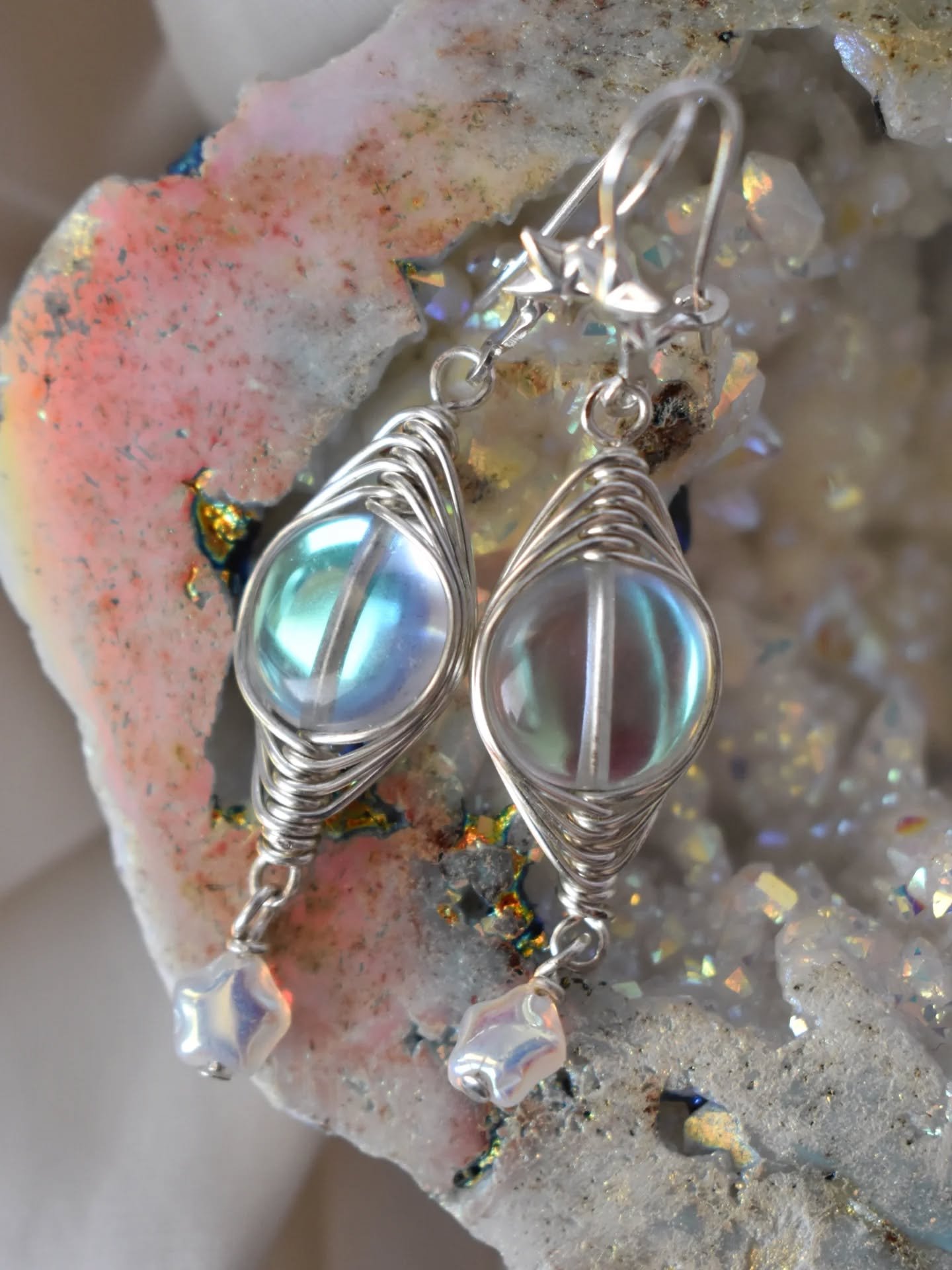 The Origin of All Things earrings, inspired by Chaos for my I'd Follow Zagreus collection. The aura coated rock crystal (totally clear quartz) is so magical. Blue? Green? Pink? Purple? Yes. And the little stars!!