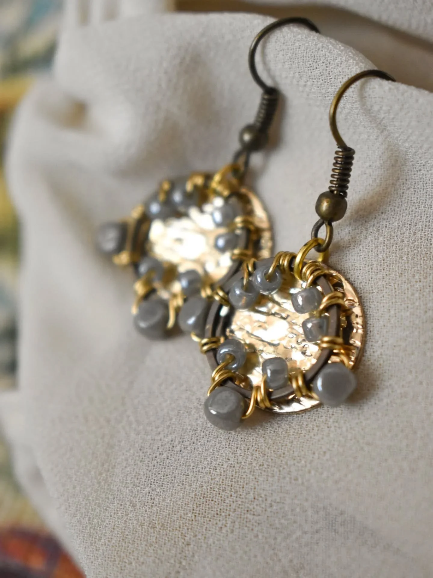 Do you suppose she's a wildflower? 💜
Wildflower earrings in lustrous grey and glimmering gold.