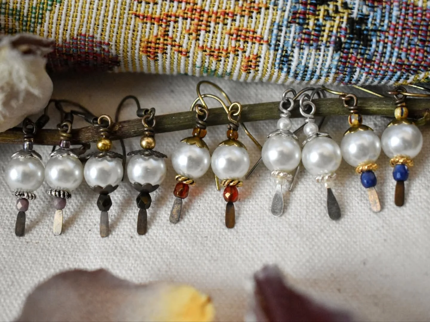New photos of the current lineup of Perlan Drops earrings (with one new pair&mdash;the all white ones). These little babies are on sale right now, along with 99% of my shop! (I haven't done the actual math; please don't check.)