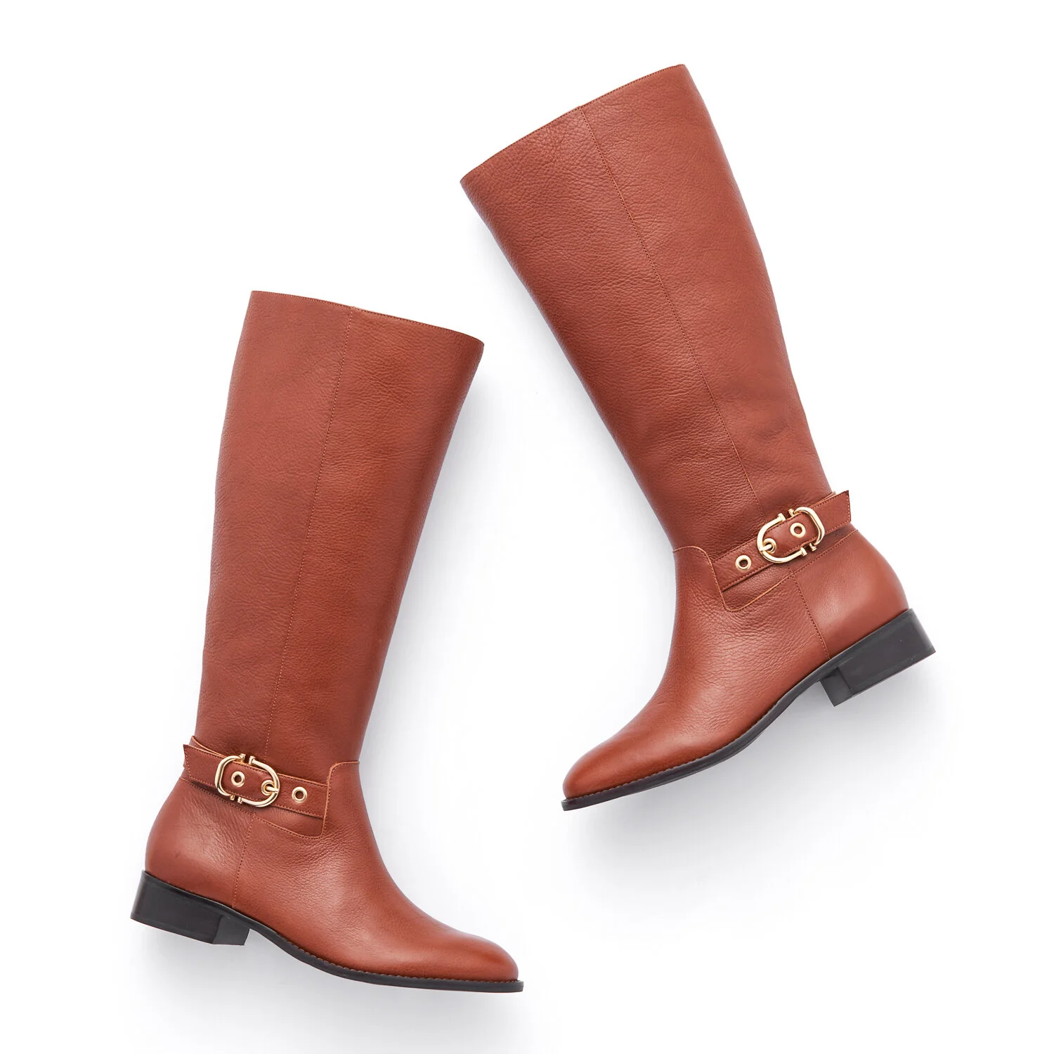 side lighting on a pair of luxury leather boots