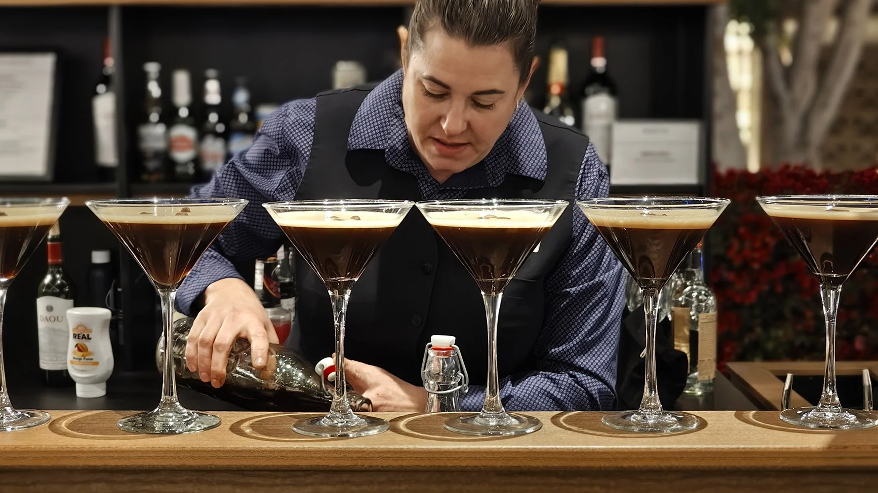 Bartender making cocktails