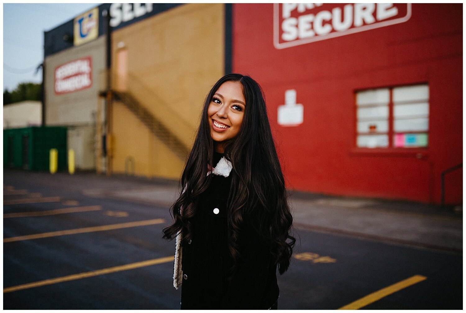  Smiling high school girl with long black hair. 