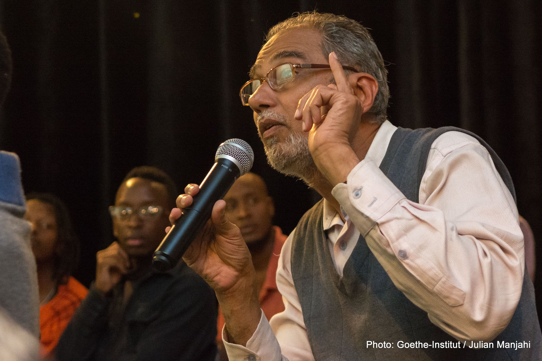 A guest speaks during the forum