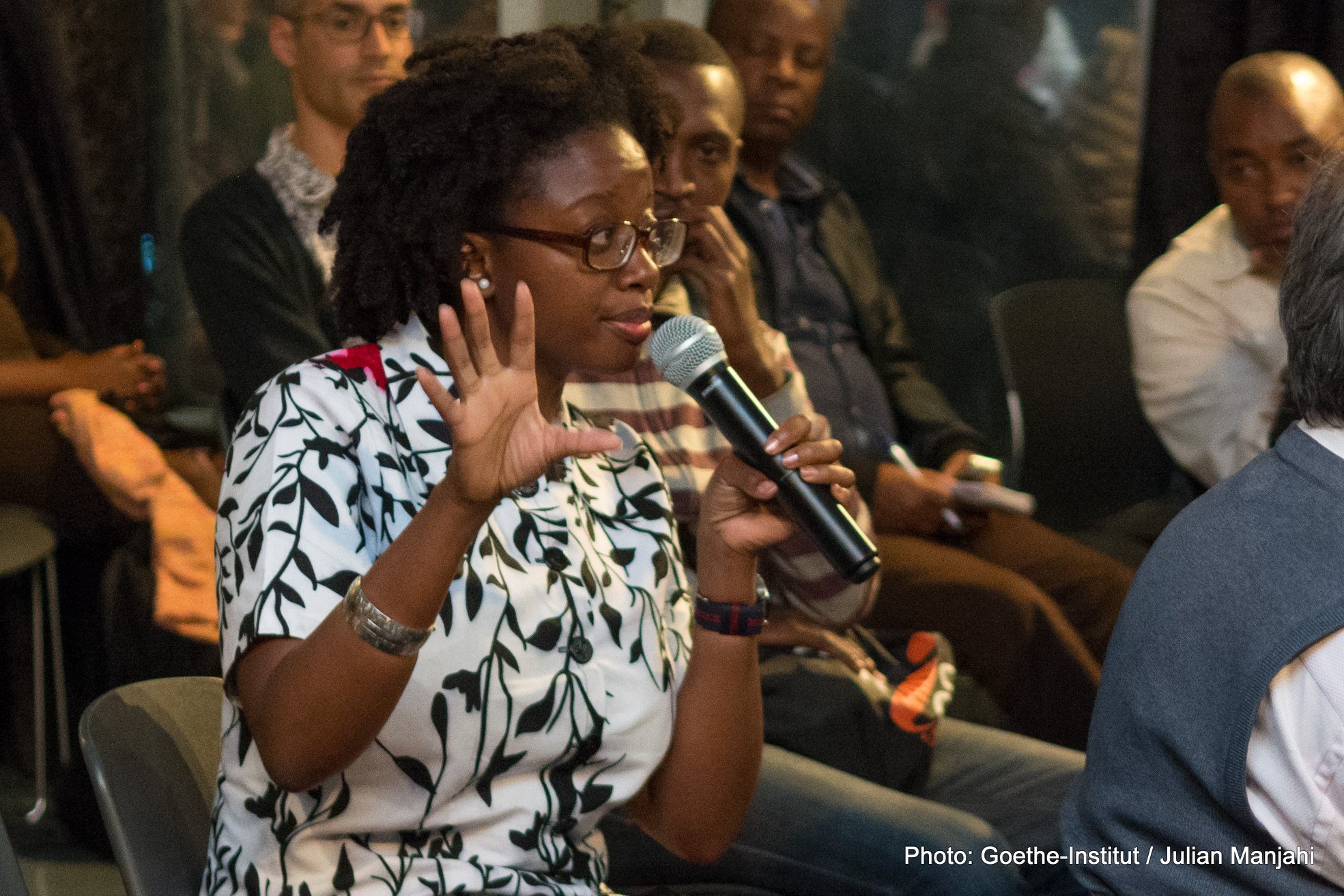 A guest speaks during the forum