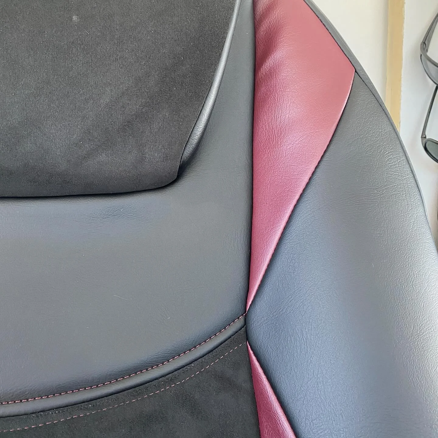 Finished this 🔥 seat for @california.dawn a little while back. Some nice alcantara from @relicateleather #frenchseam #topstitch #alcantara #upholstery #fishing #catamaran