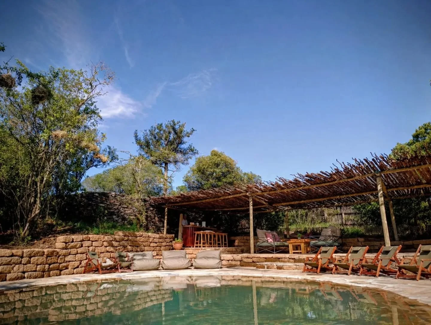We tried, OK, we tried! We tried to get real, profesh photos taken of our beautiful new pool area but the May rains 🌧️ kept getting in our way! 

So, for the moment, this photo (taken on Ed's ancient phone, no less!) will have to do! 

We are so exc
