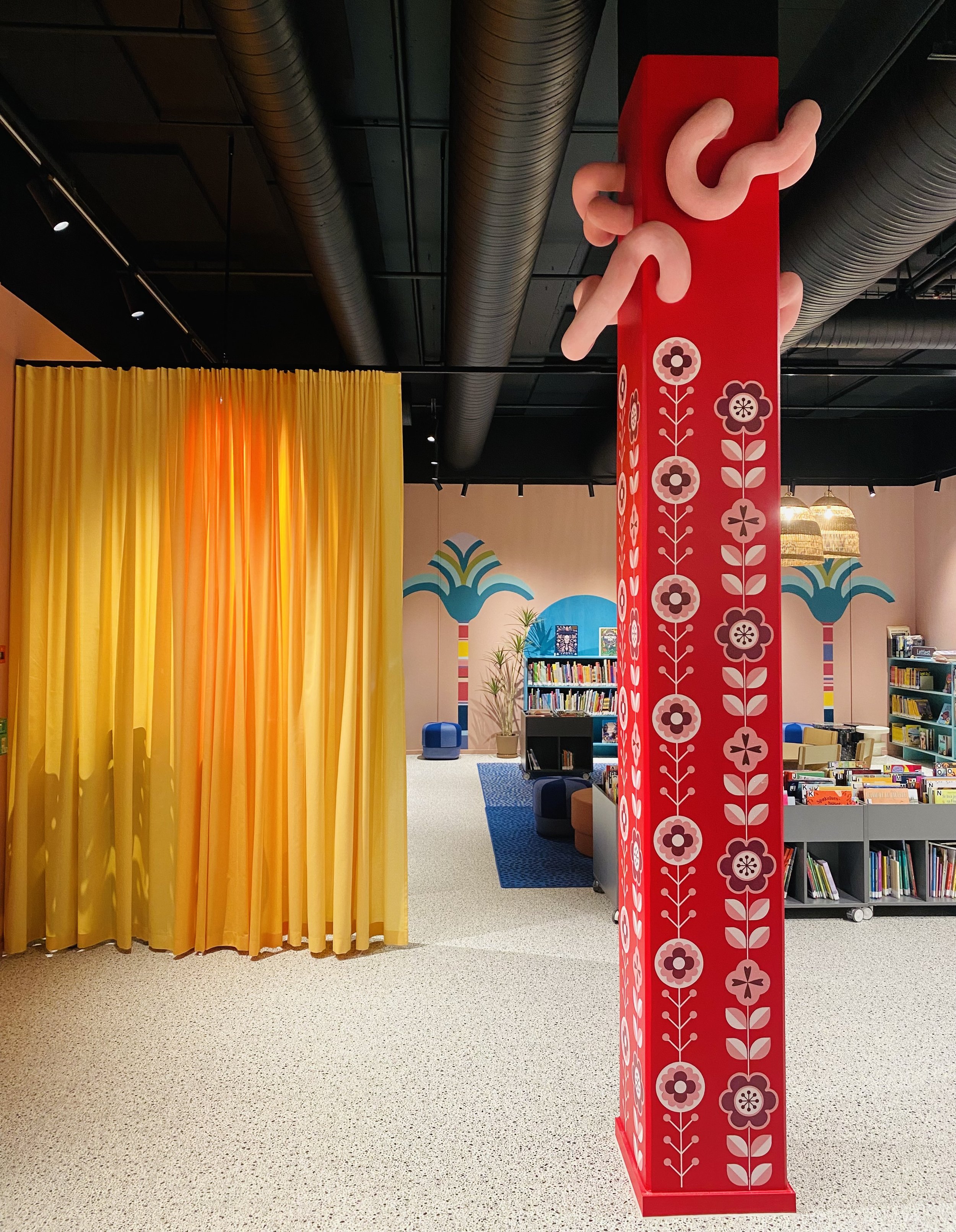 yellow curtain and sculpture pillar.jpeg