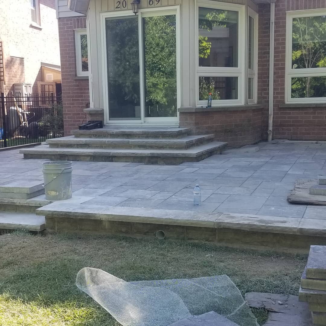 A raised patio
Who would want a deck?