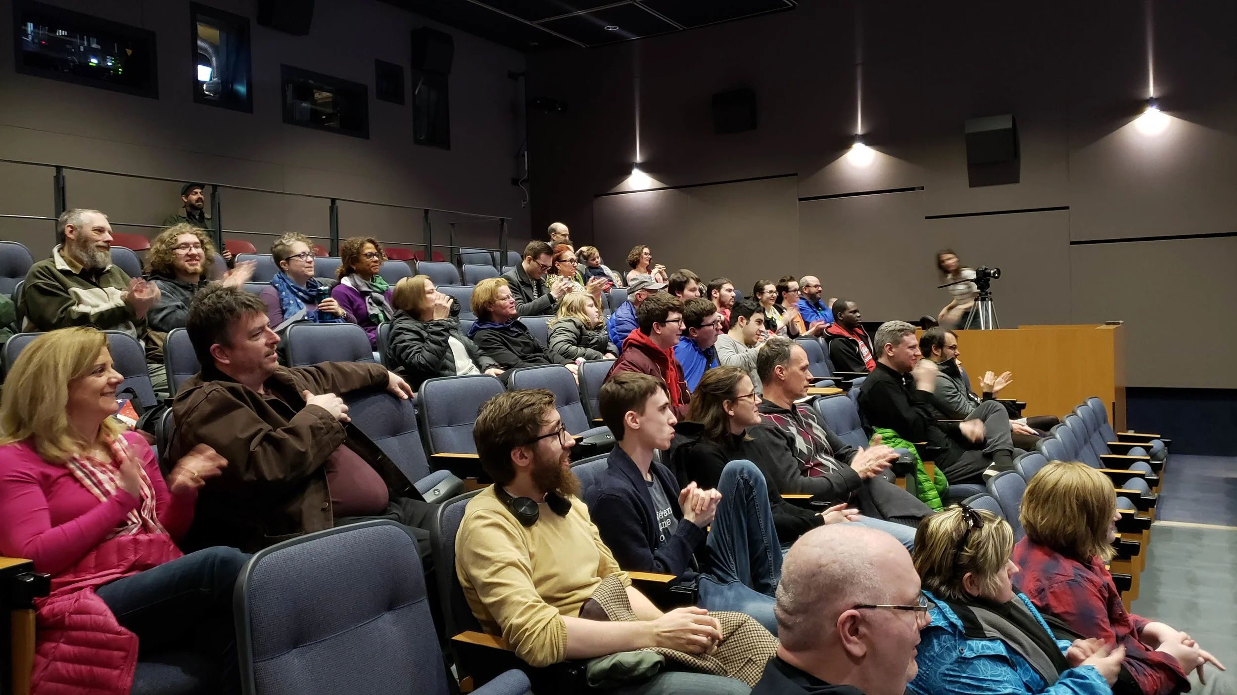The audience all smiles during the Q&A