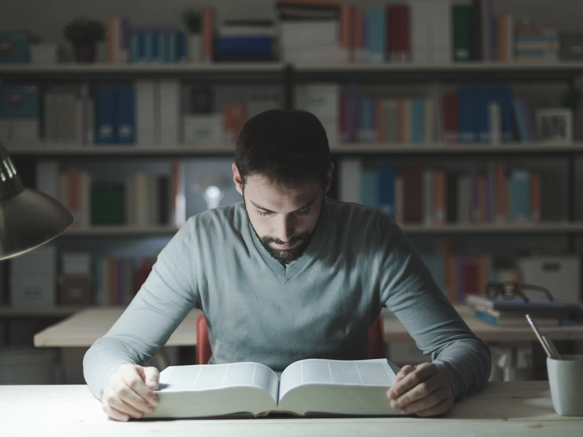 smart-man-studying-at-night-P3DMWXV.jpg