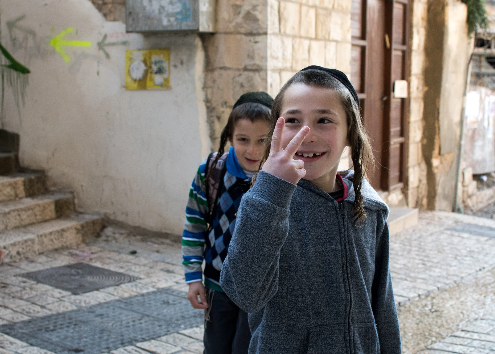Little Boys and Peace or Victory in Color. Photo by @the_human_journey_ Used with permission. Click picture for a larger image.