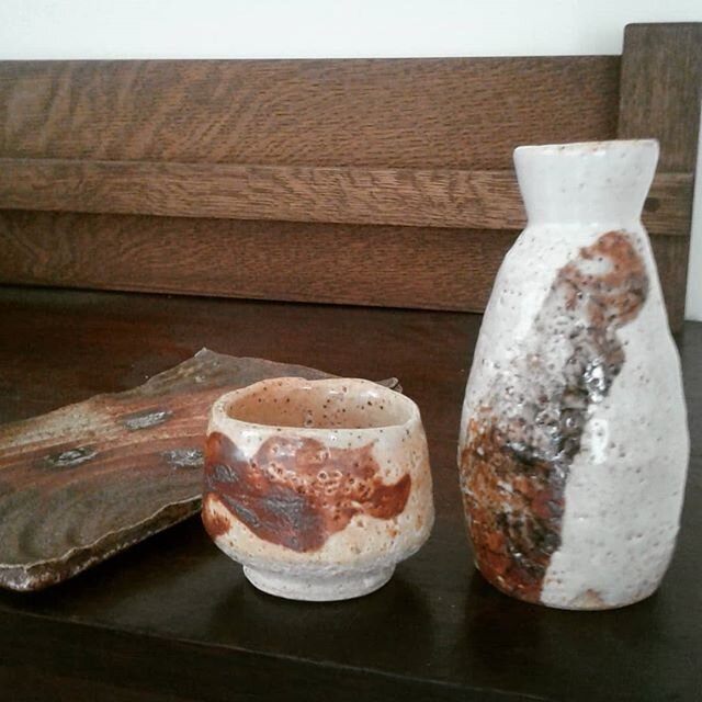 Sake bottle and plate from the most recent firing.  The iron came from my sister's yard in Knoxvillel.  #sake #sushi #wildclays #pottery #ceramics.