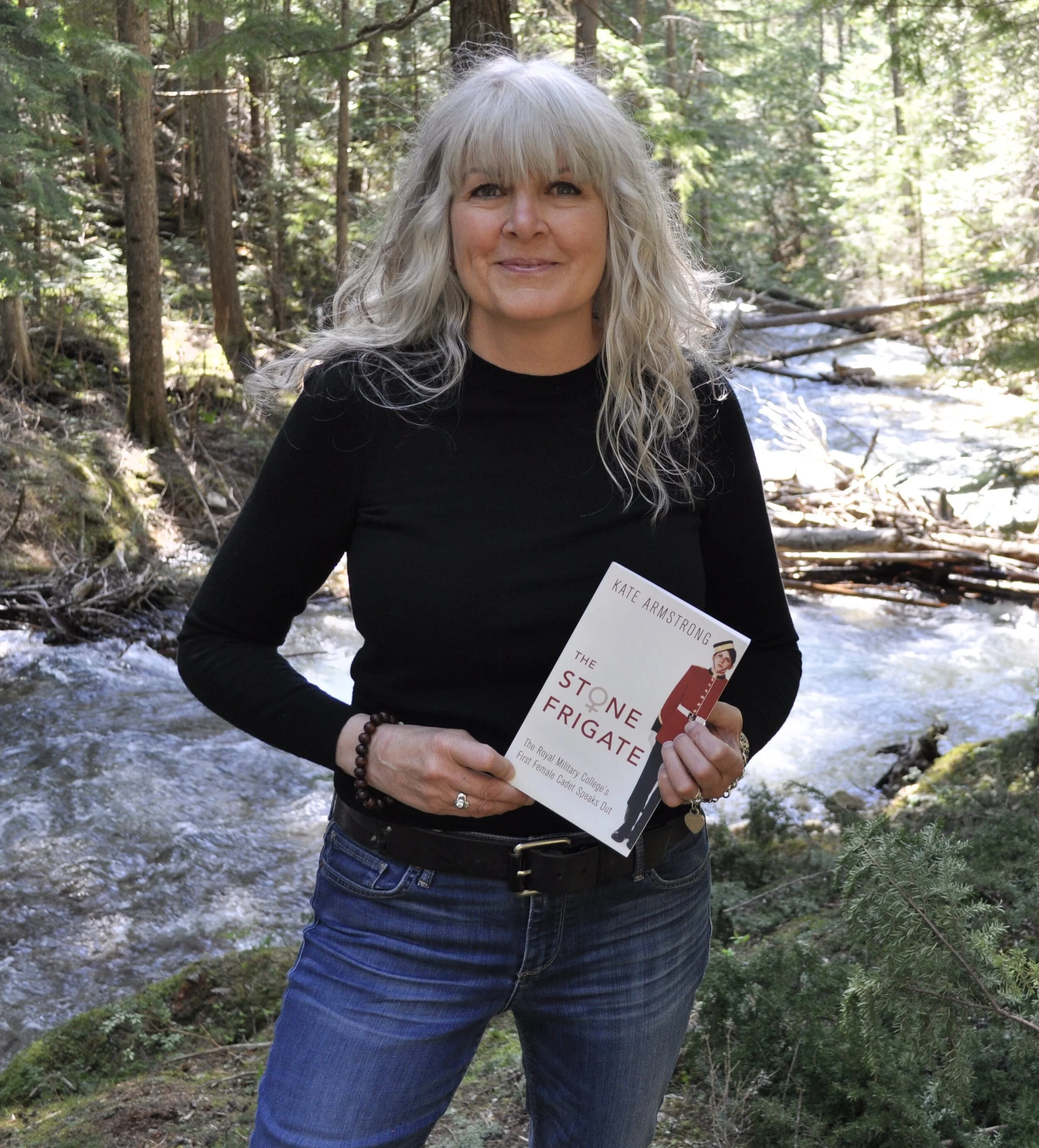 Kate Armstrong is seen here with a copy of The Stone Frigate at her home near Nelson. Photo: Tyler Harper