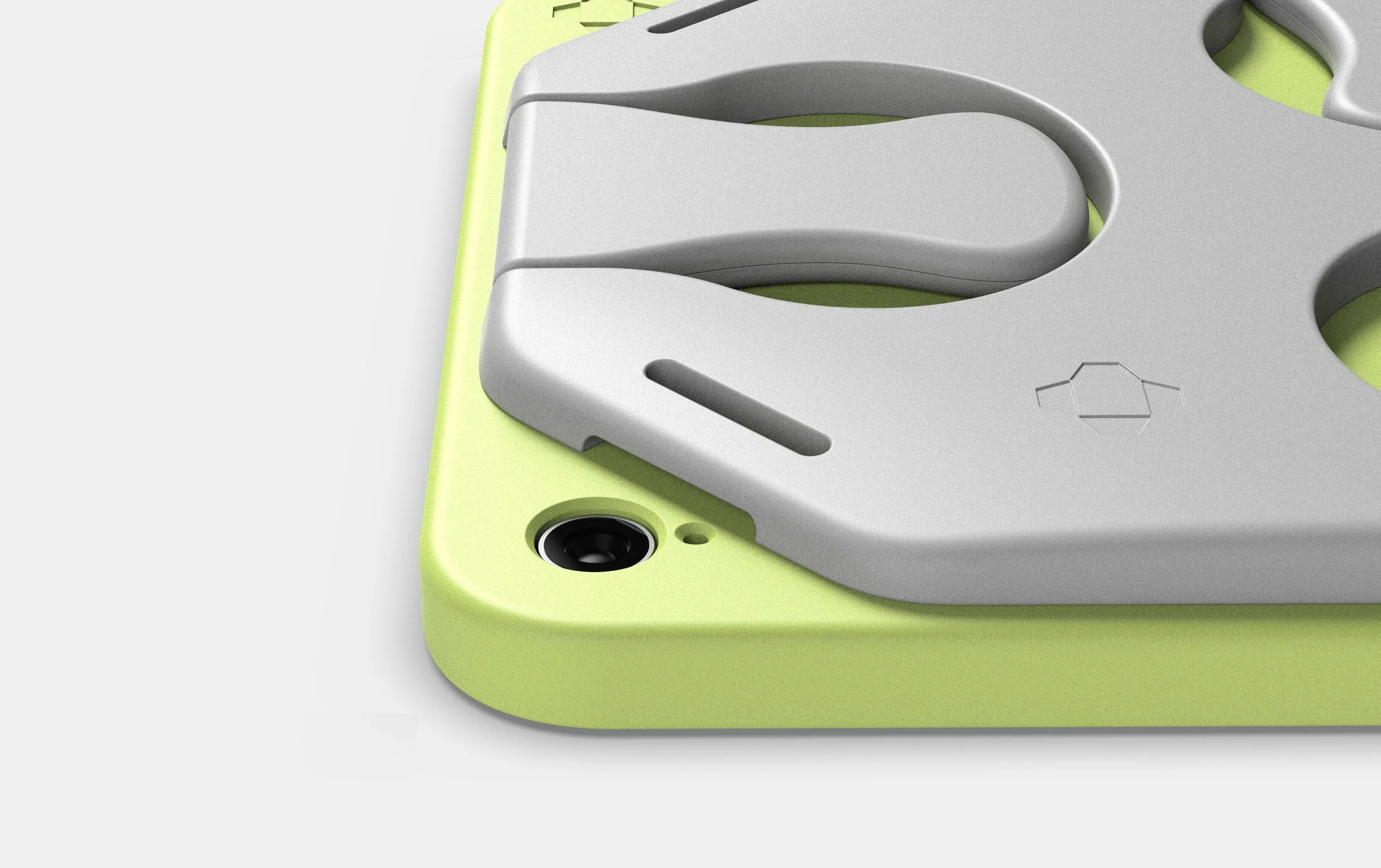  Refined detailing around the main features of the iPad, including a flexible wing module to allow the same grip system to be used on different tablet brand cases. For professional users, slots for a neck / shoulder strap has been added.    