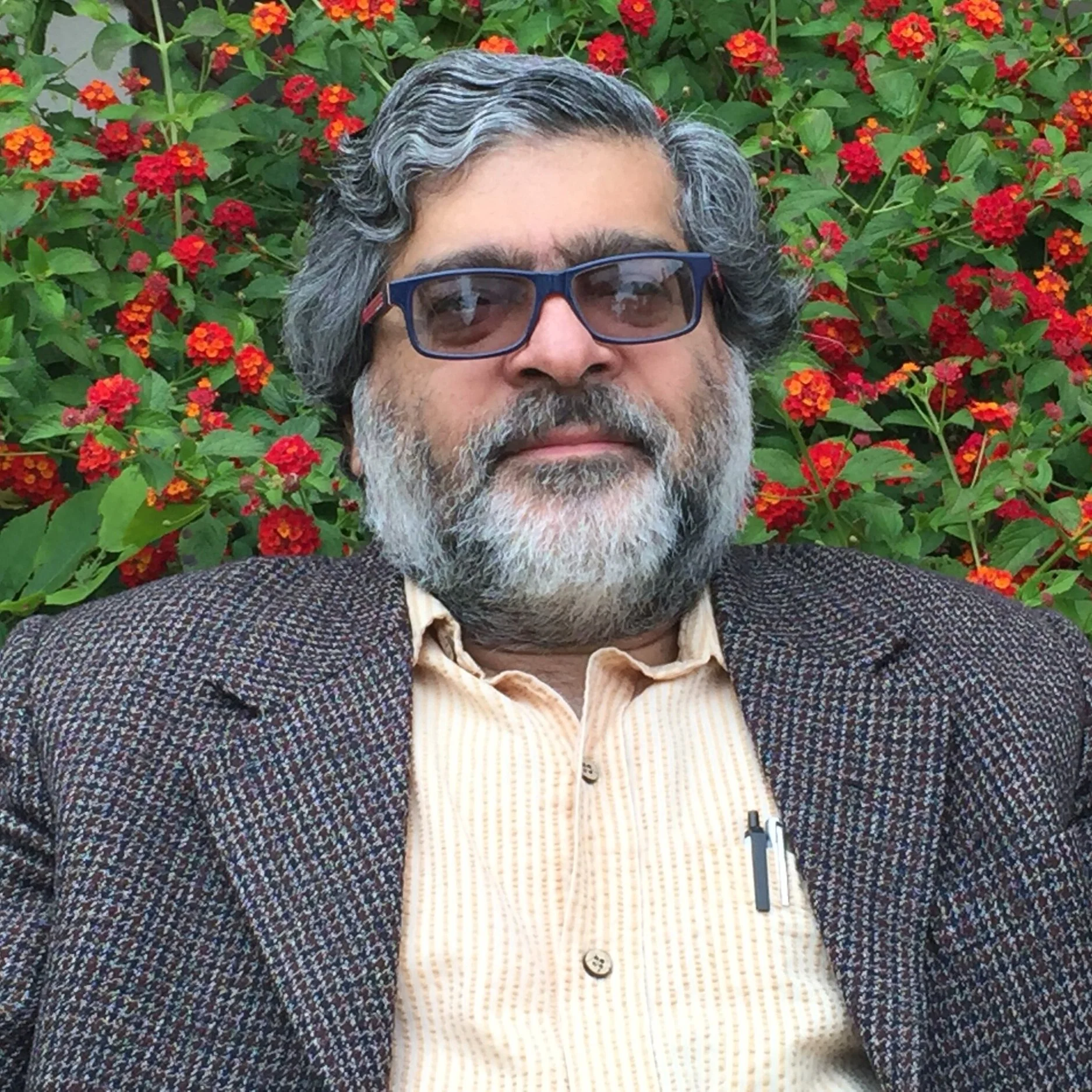 Vinay20May2016WFlowers.jpg