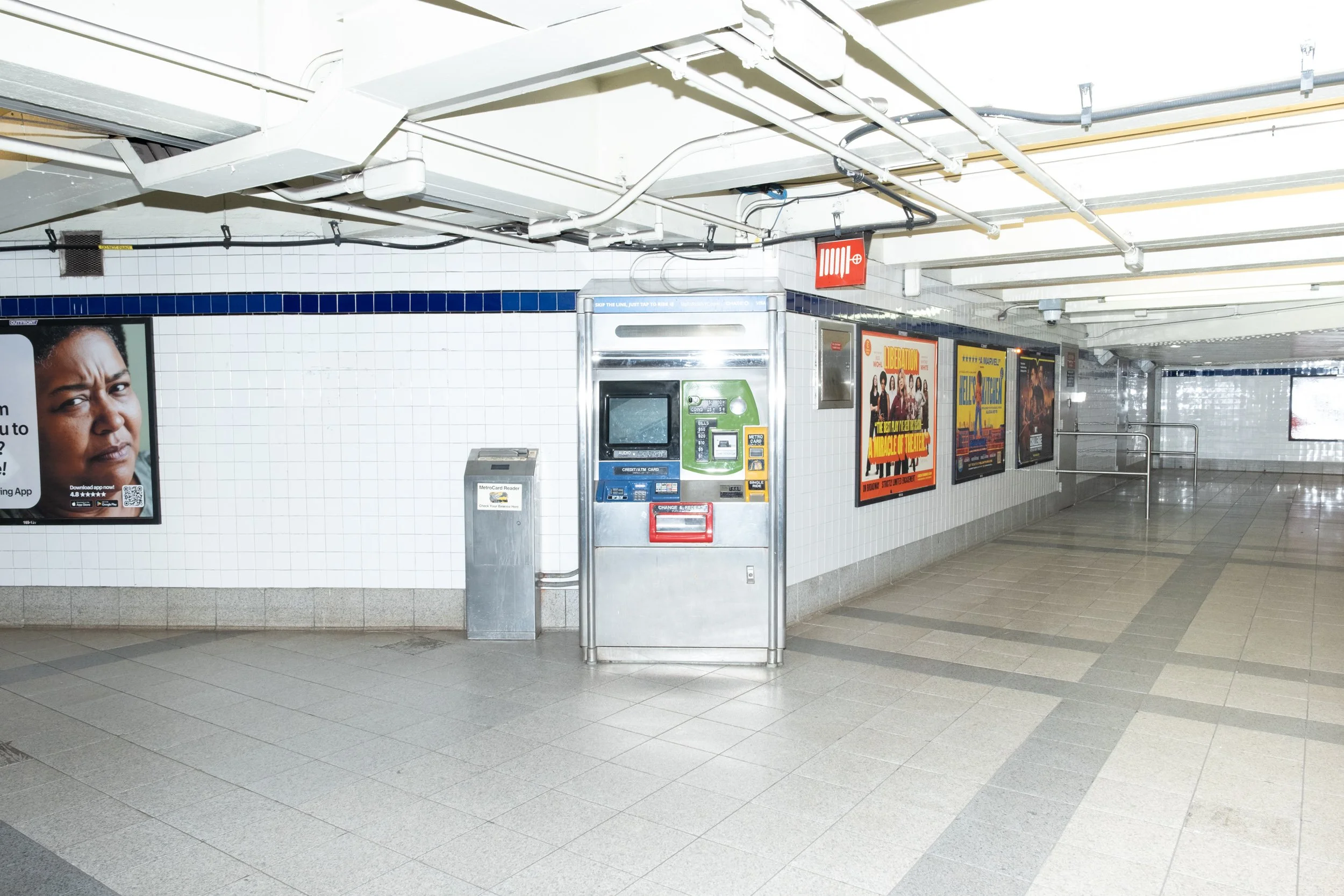  The bright, bold accent colors on the Metrocard machines, partly a product of a different era of design, evoke the color of the train lines. They are in contrast to the OMNY machines, which are more sterile looking. 