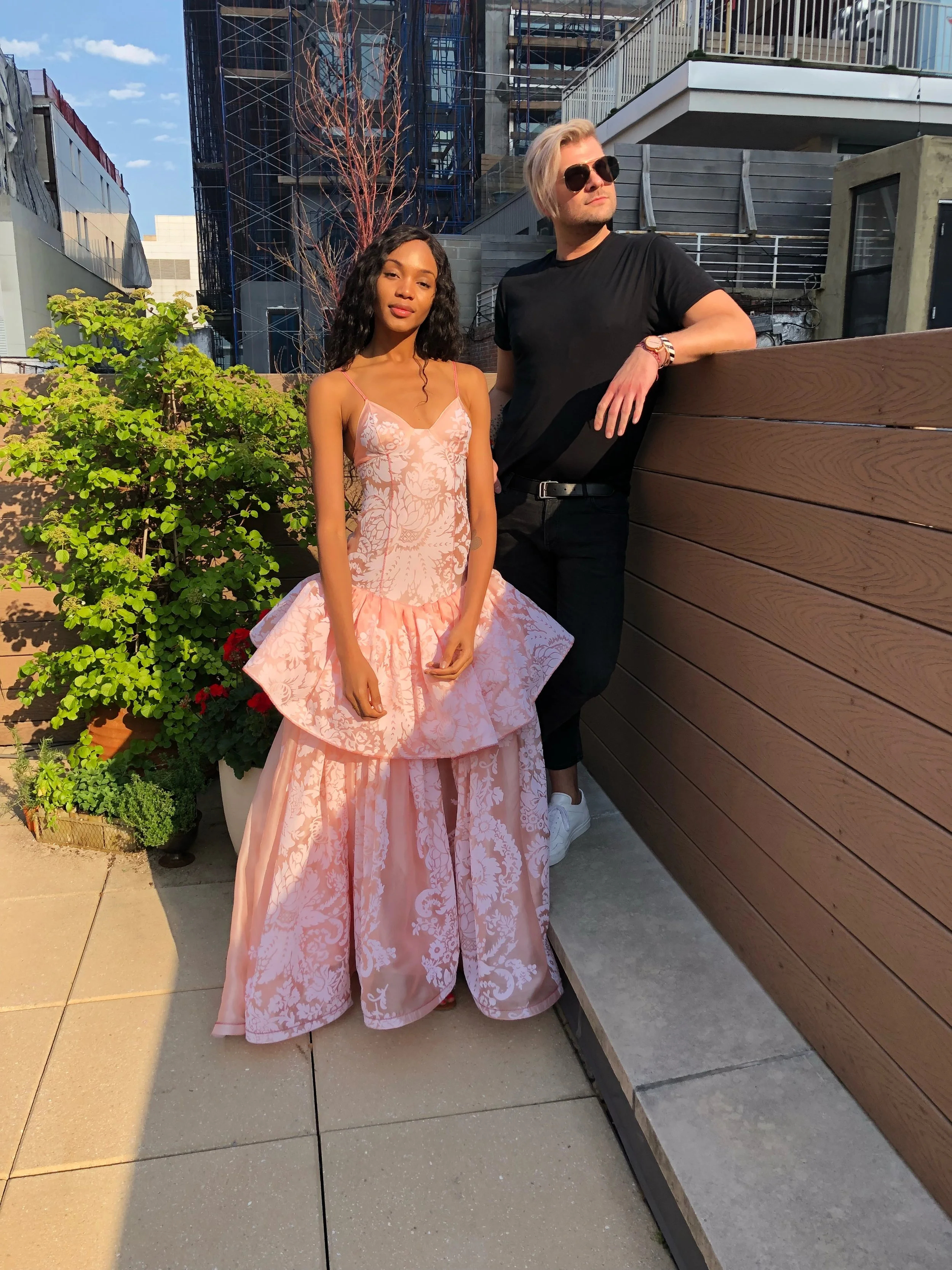 Posing with the models at the Rosie Assoulin showroom in New York Market Week 2018; photo Robertson’s own.