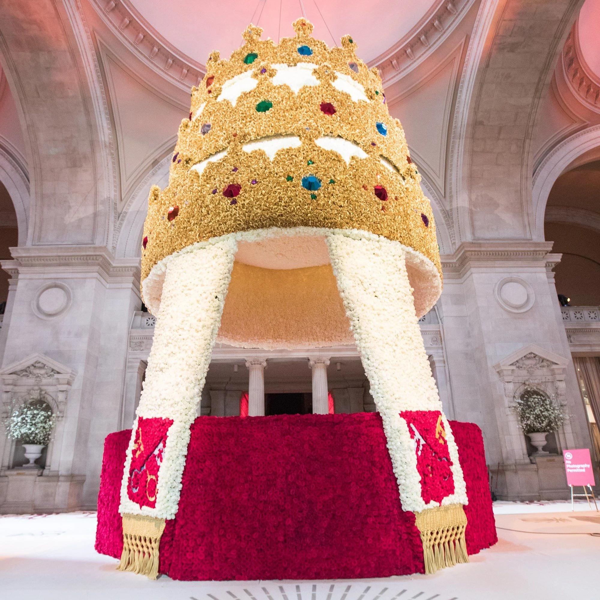 The entrance to the Met is always transformed into a floral fantasy themed around the year’s central visuals like this one from last year’s ‘Heavenly Bodies: Fashion and the Catholic Imagination. Photo via Pinterest.com