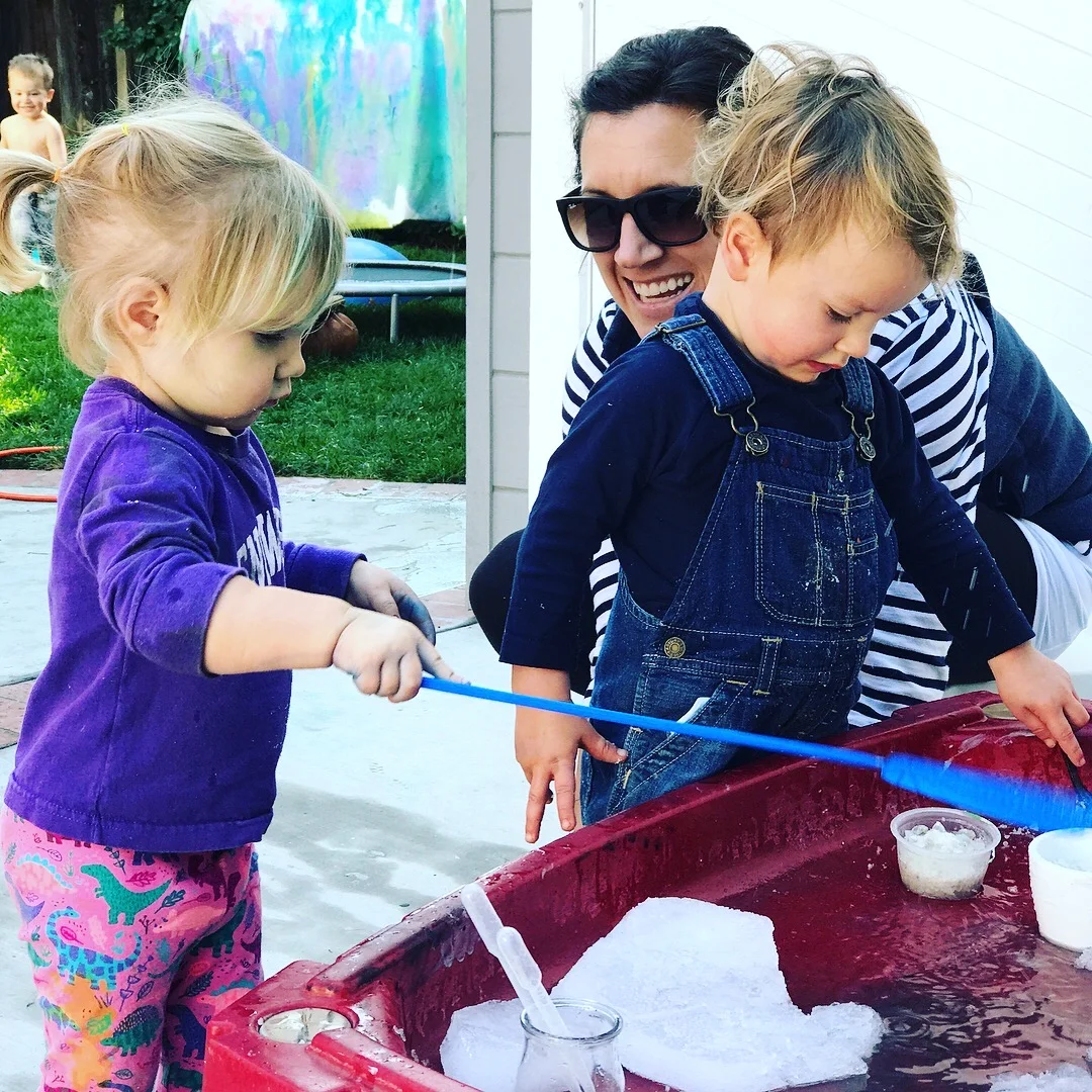 Melting ice by transferring warm water with pipettes, scooping salt, and pouring, the kids worked on wrist mobility, finger strength, and motor planning as they figured out how to use the pipettes.