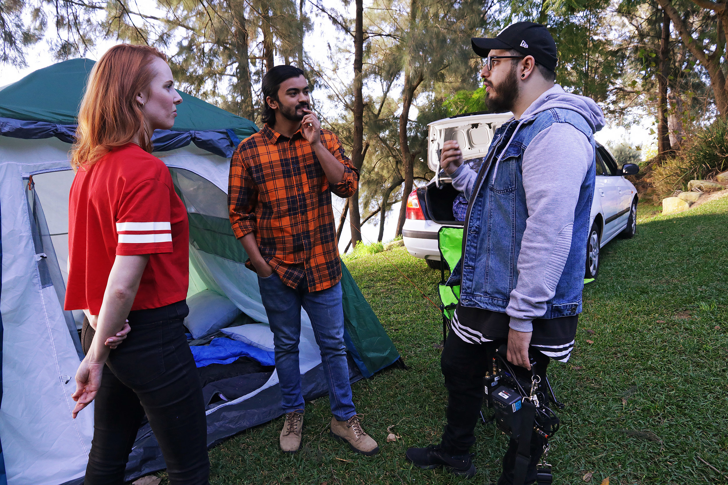 Matt directing Neel Kolhatkar and Rachel Baker on the set of NOBODY LIKES CAMPING (2020)