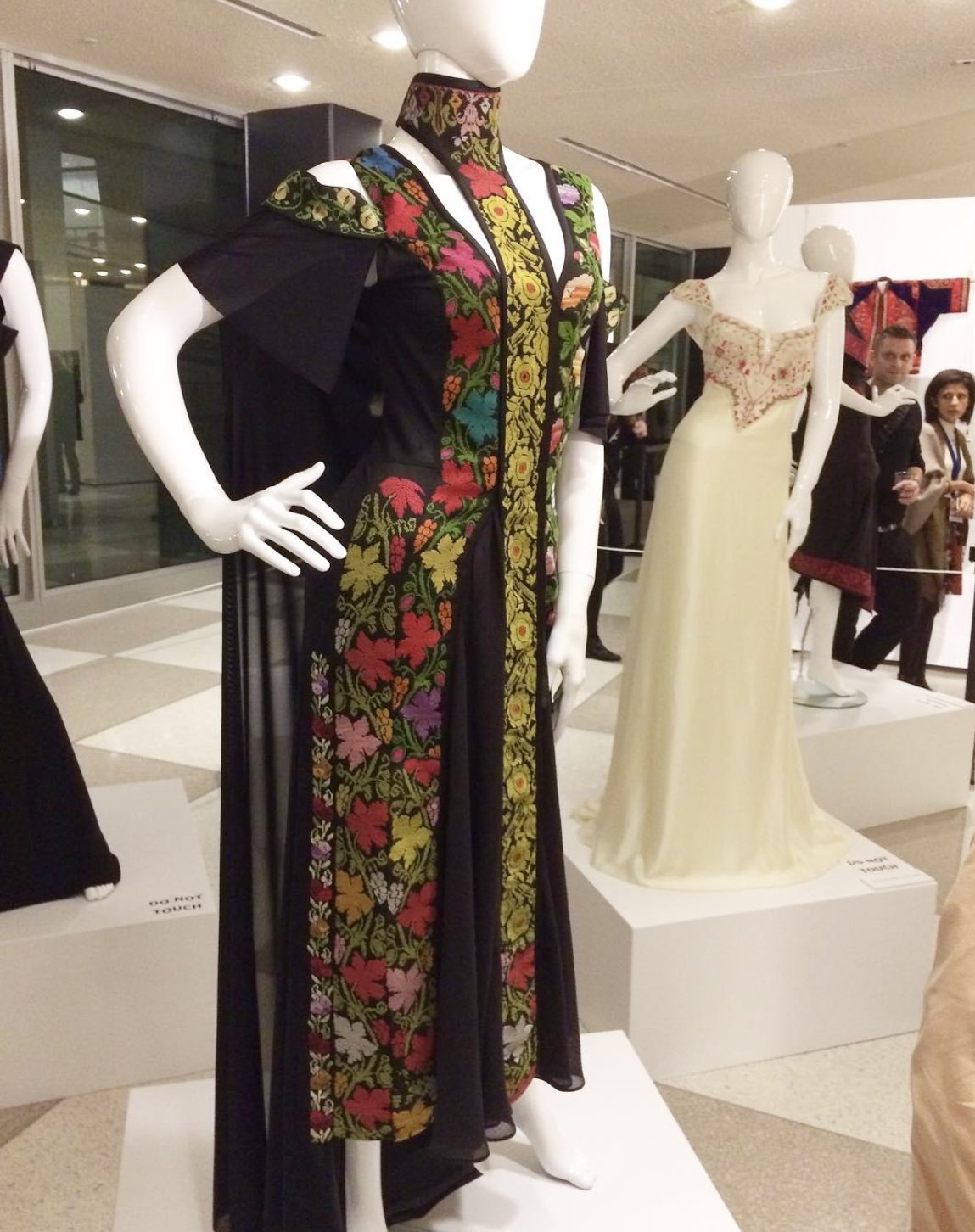 The opening reception last night for the exhibit "Palestinian Embroidery: Threads of Continuity, Identity and Empowerment" at the UN here in NYC. My dress on the left consists of using vintage Palestinian hand embroidered remnants from the 1950's, re