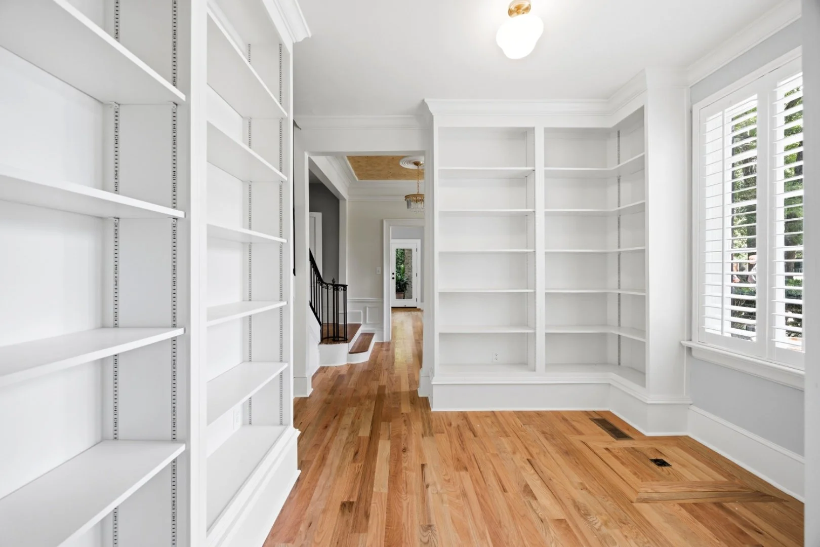 Custom built-in bookshelves, floor to ceiling.