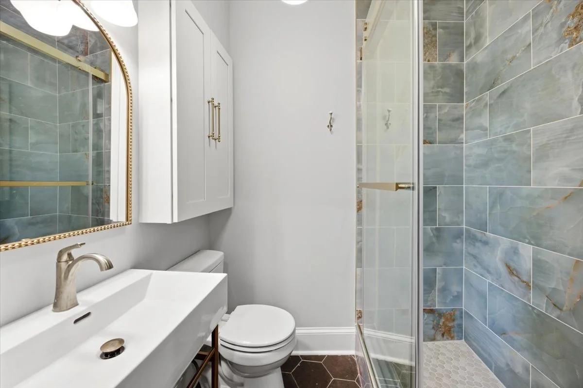 Custom bathroom vanity, built to match the home's character.