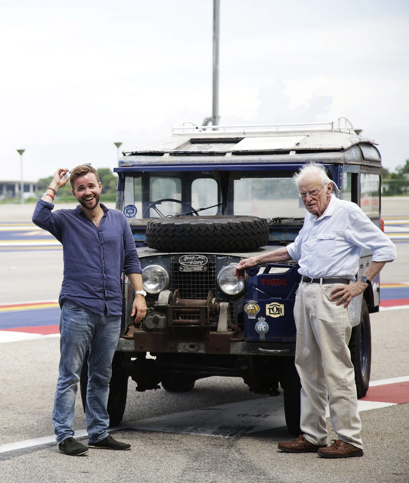 Alex (Left) & Tim (Right) standing with Oxford in Singapore.