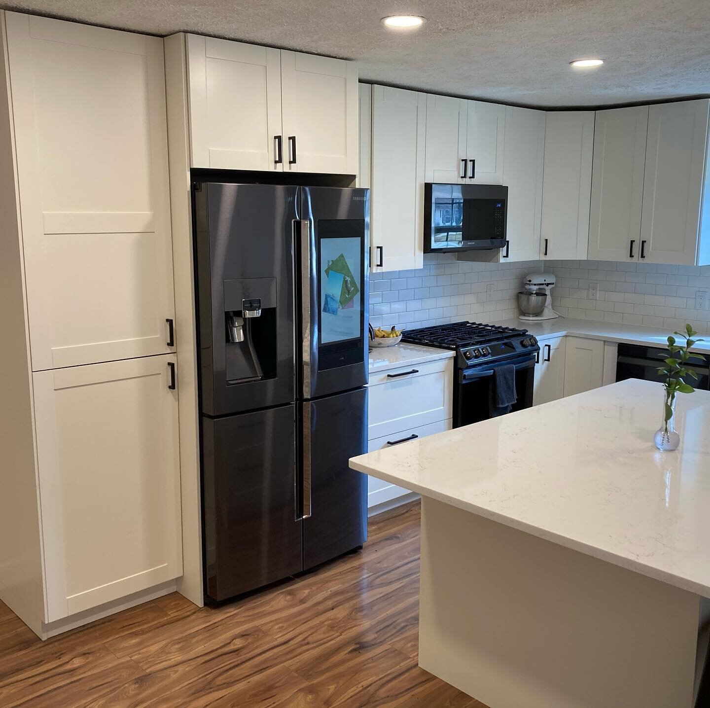 Finally have some pictures to share with you from a kitchen remodel last fall! What a difference! This one has it all. New cabinets, countertops, flooring, lighting, and a beautiful new island that easily seats 6! A big thanks to our customer who eve