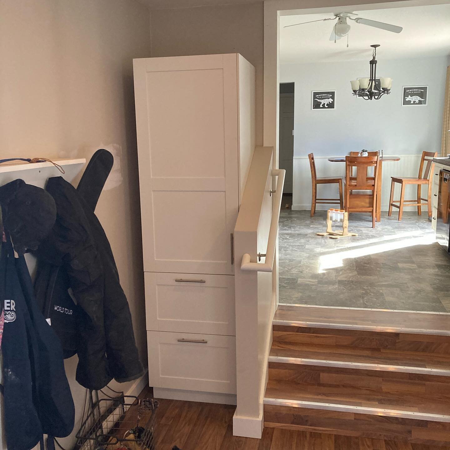 A mud room/breezeway remodel that added a lot of function and comfort to this home! We enlarged the opening to the kitchen and added a half wall and railing to make these two spaces work well together. The added storage with two new pantry cabinets p