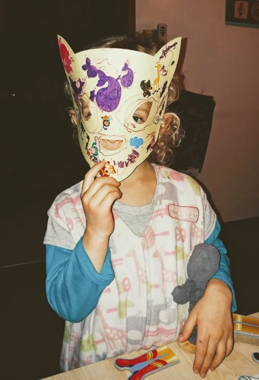Ellie and her cat mask - she’s been running around the house and hissing at us this week