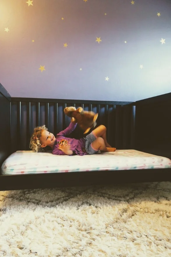 took off the bars and made the switch to a toddler bed!