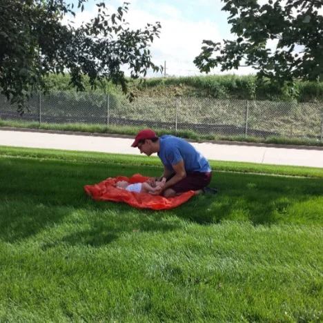 Day 2: Enjoying the shade at an office park in West Des Moines, IA
