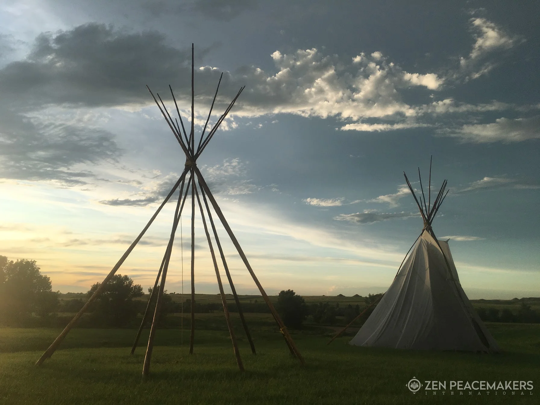 Lakota tipis at sacred site of Bear Butte, South Dakota - moments before a storm rolled in.