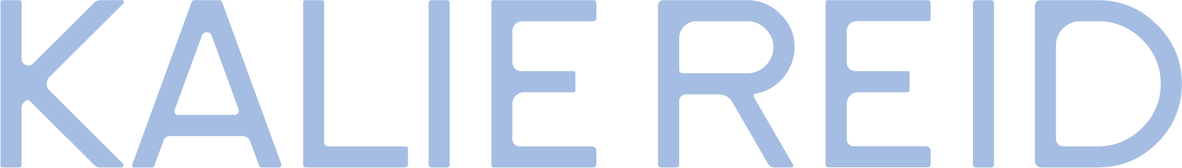 Close-up of the word 'KALE RED' written in large, light blue letters on a black background.