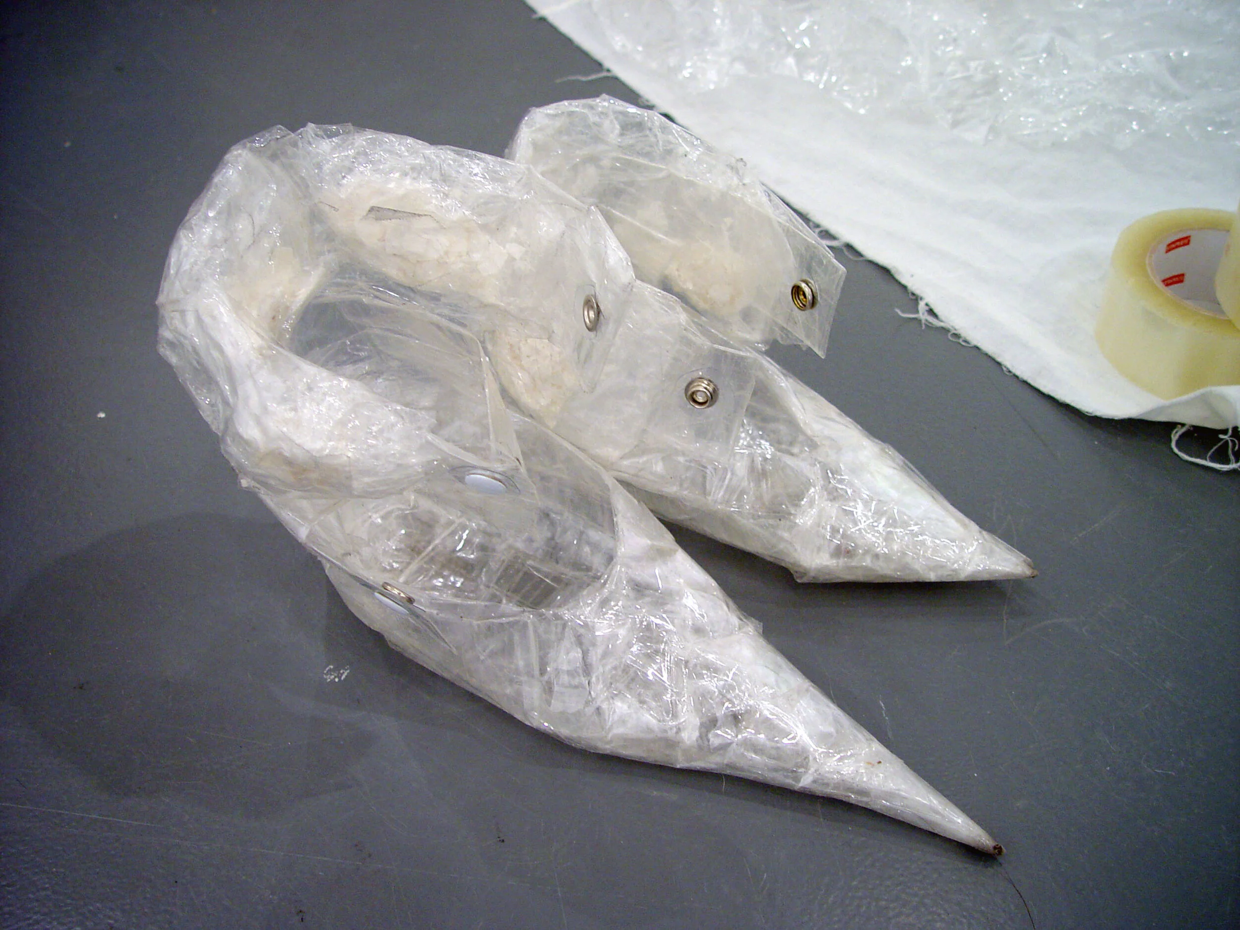   Dress for Today no.6 Part I , Shrink-wrapped eggshells, Shoes, 2008 