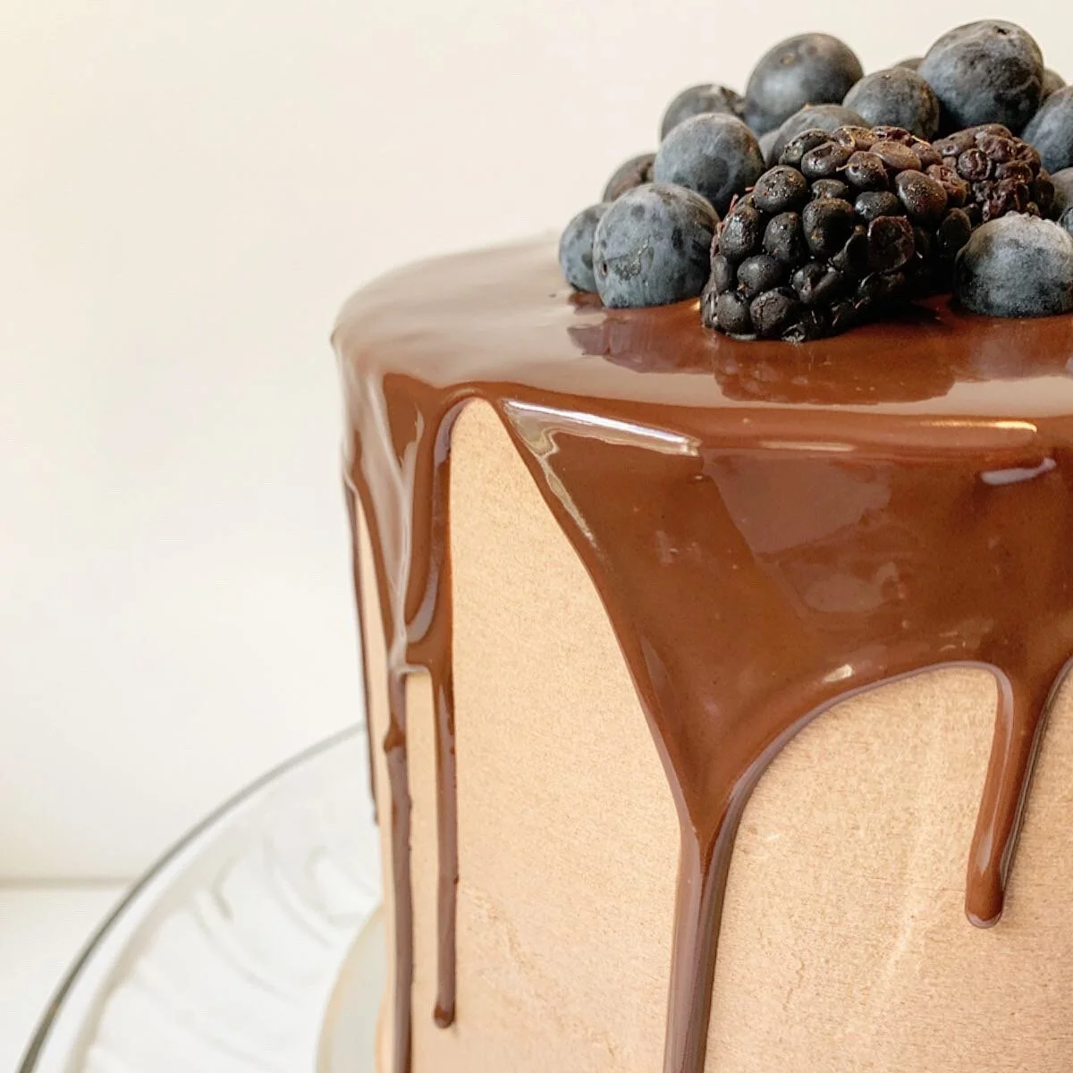 Chocolate cake with chocolate swiss meringe icing and chocolate drip