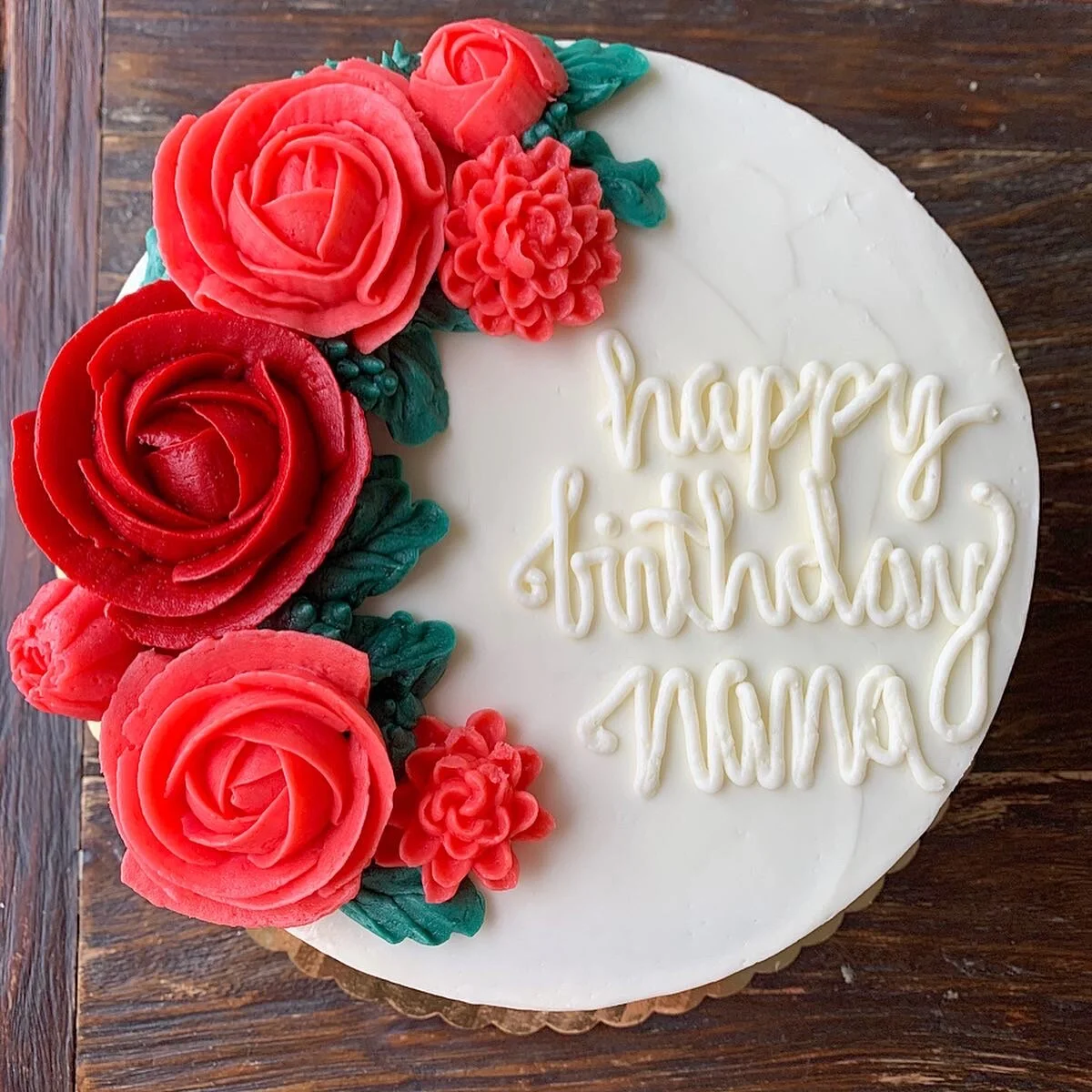 Gluten free rustic vanilla cake with buttercream flowers