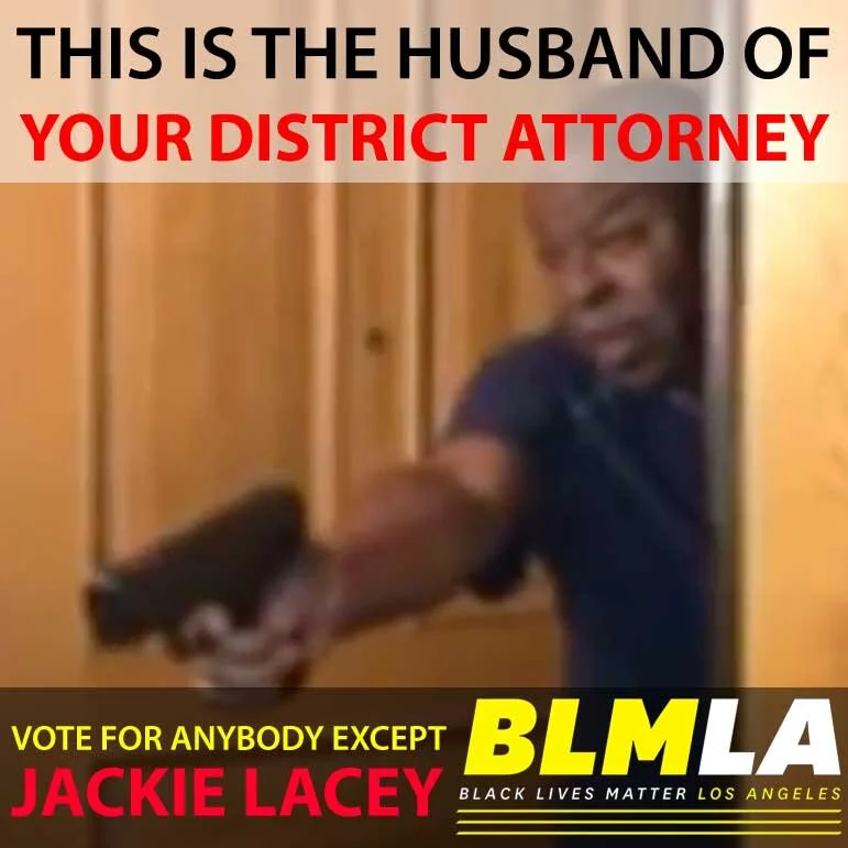 Jackie Lacey's Husband Aims A Gun At Activists
