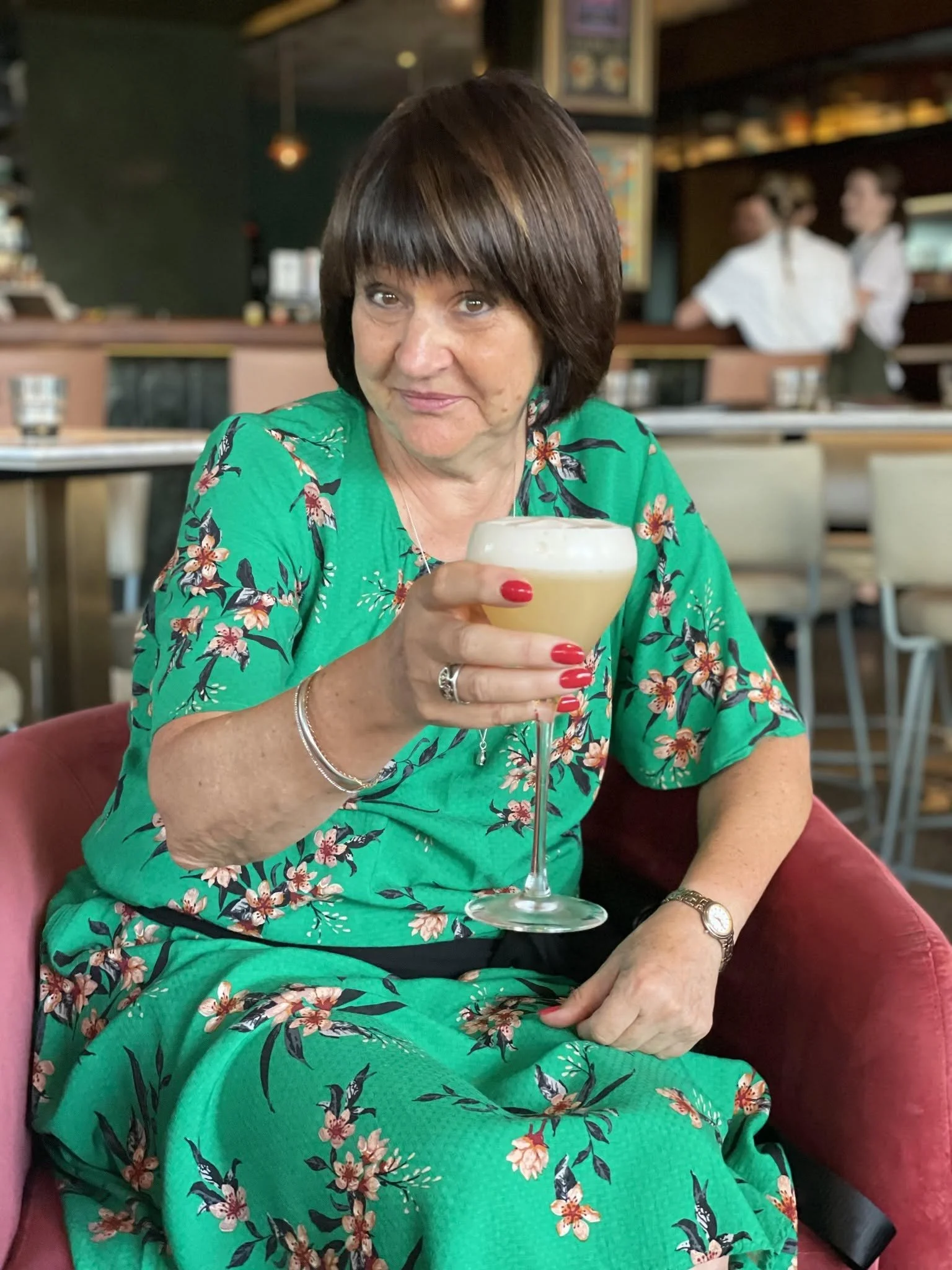 Sue C enjoying a cocktail.jpg