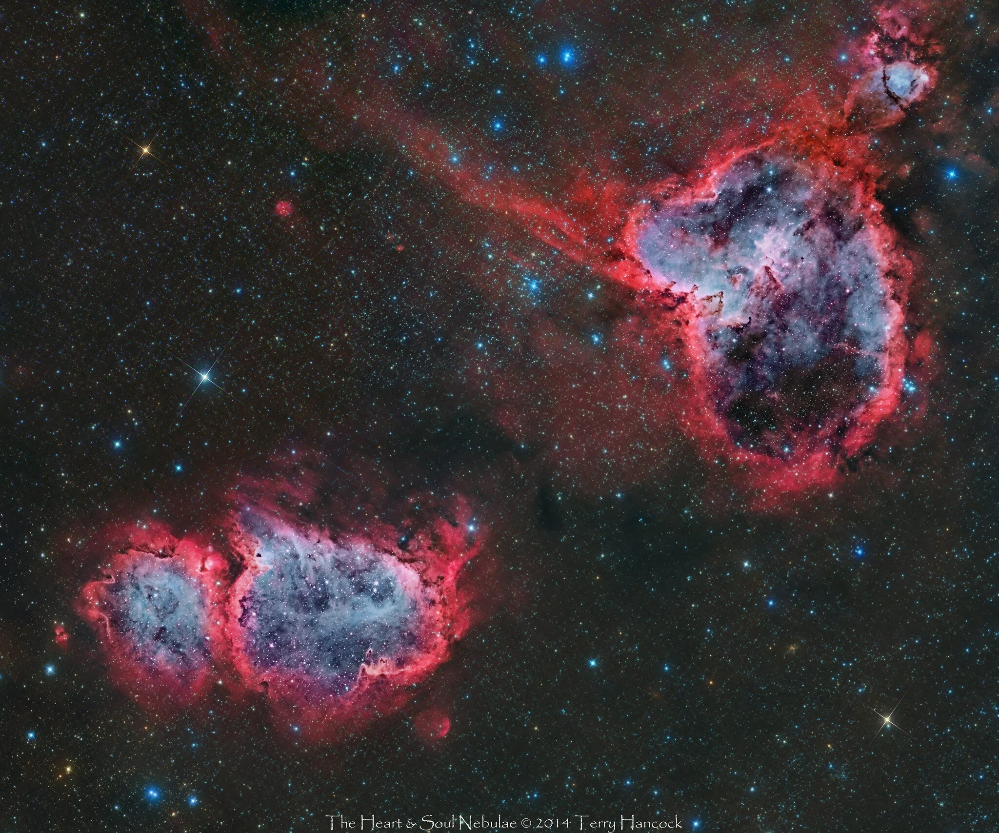 Image by Terry HancockA Hybrid View Of The Heart &amp; SoulAlso known as IC 1805 The Heart Nebula &amp; IC1848 The Soul Nebula, this is a Hybrid process using both Color (RGB) and Narrowband (H-Alpha, SII and OIII) and a crop of my 4 panel Mosaic of…