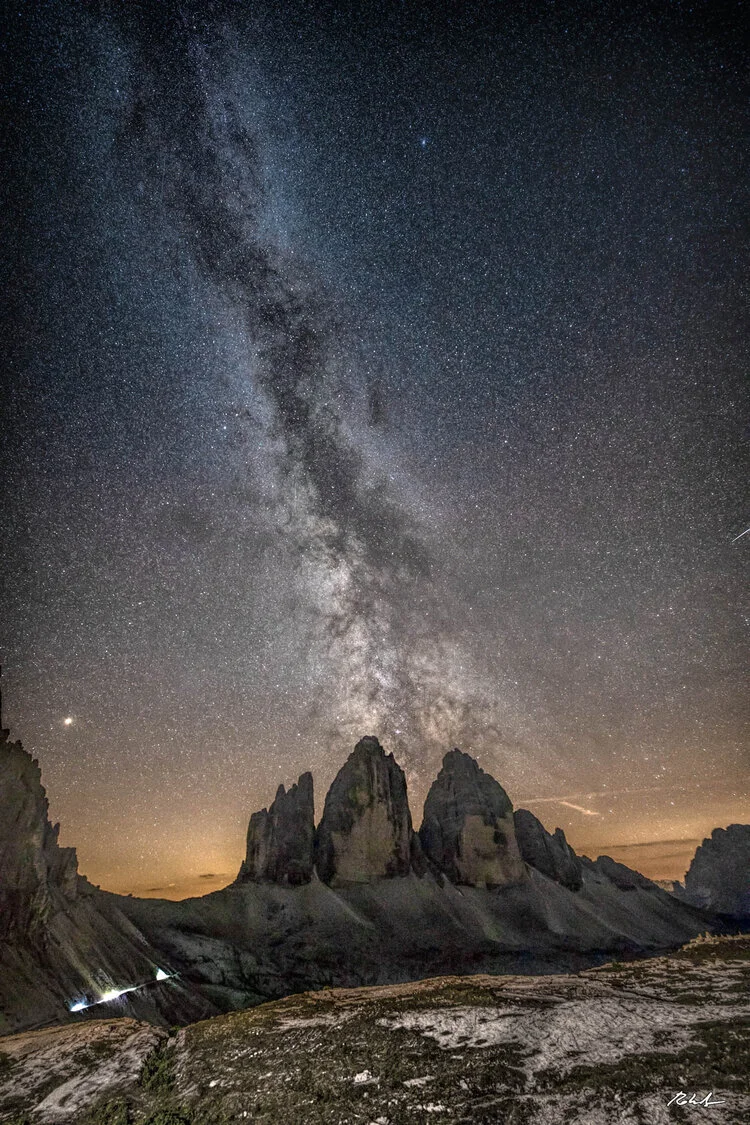 Image by Roberto SaltoriSummertime. Plus trekkers.Last of a series of popular shots.The big "star" is Mars, on his summer on steroids. The lights on the left are trekkers, walking at midnight, in a beautiful summer night.. A "hint" of a shooting sta…
