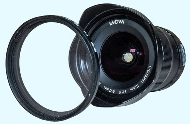 Though a very wide lens, the 15mm Laowa accepts standard 72mm filters. The metal lens hood is removable. © 2019 Alan Dyer
