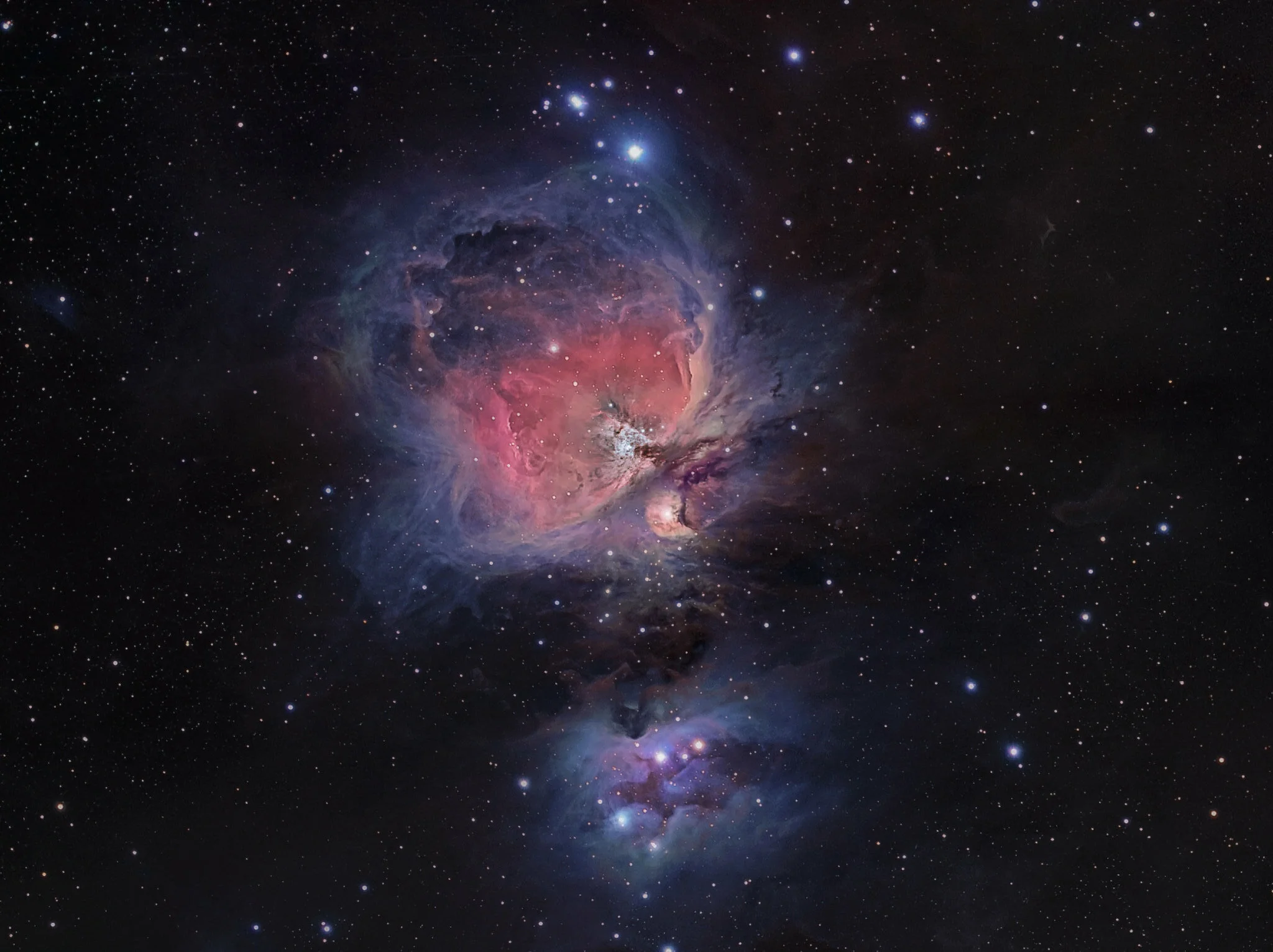 Image by Chuck Manges Orion NebulaM42 The Orion NebulaSince we're currently getting buried in snow and there's no clear skies in sight, I decided to "practice" on M42. I used 6 panels from my latest hyperstar mosaic as luminance. www.flickr.com/phot…