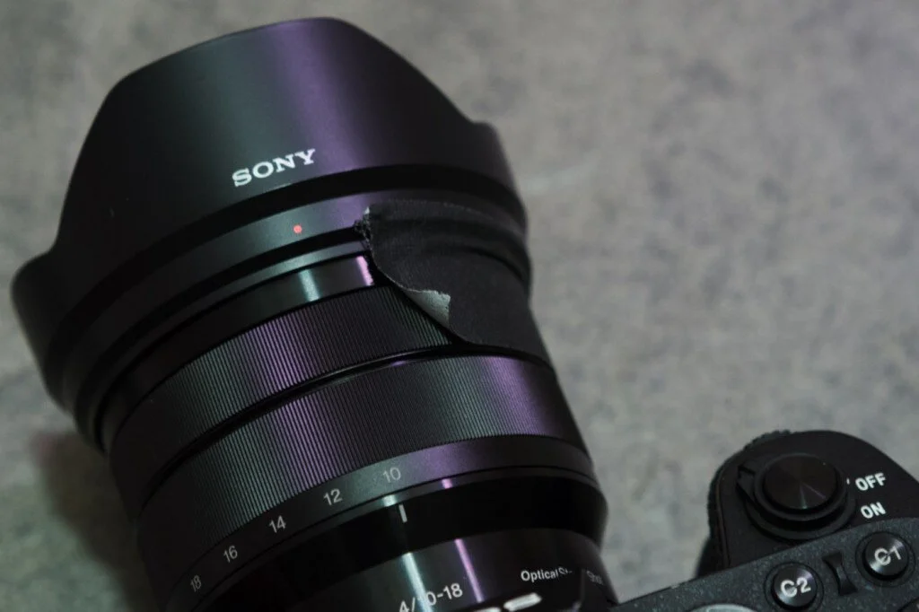 When focused is achieved, you can tape the focus ring to prevent it from moving.