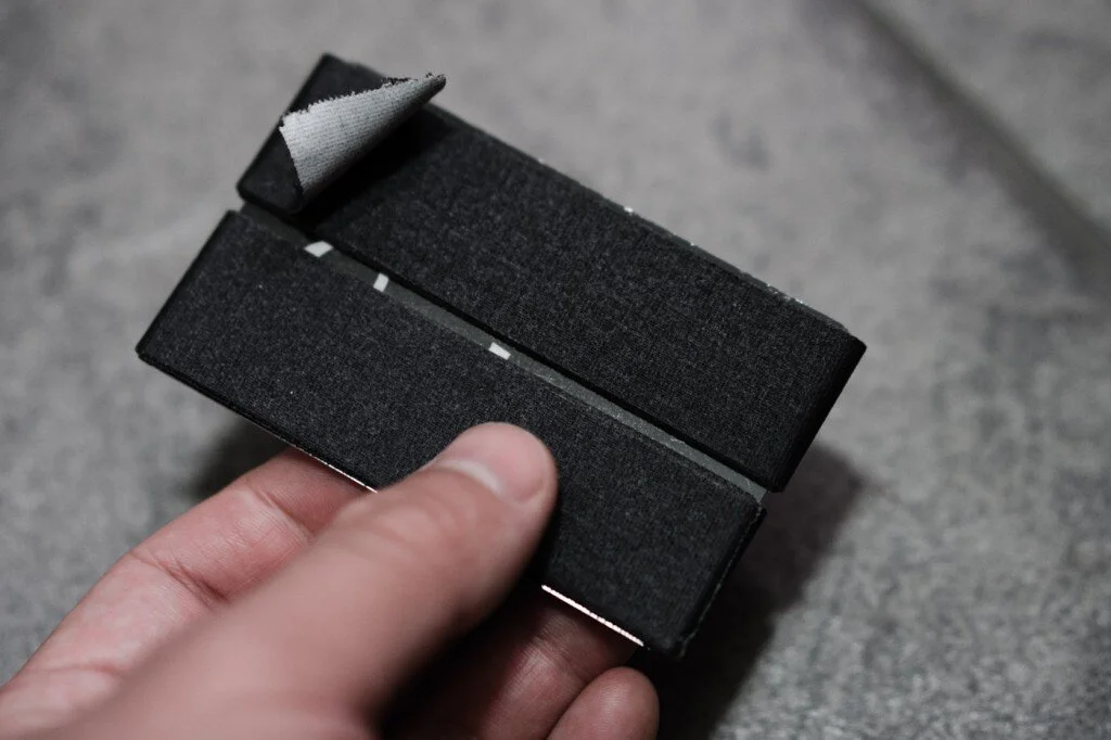 Wrapping an old credit card with gaffers tape is a compact way to always keep some with you.