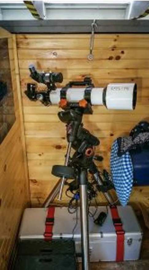 Explore Scientific 102mm APO Refractor mounted on AVX field tripod.