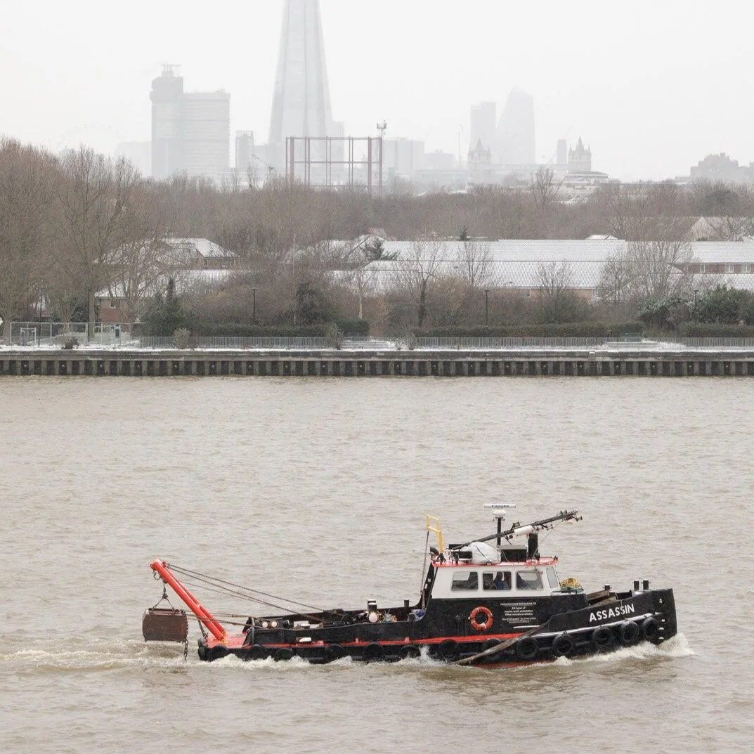 A rare snowy day by the Thames in London